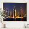 Designart - New York Skyline at Night - Cityscape Photo Framed Canvas Print